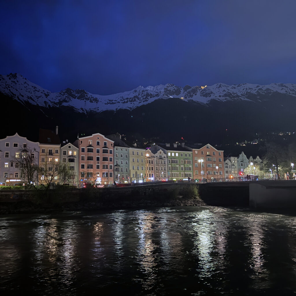 a river running through a city at night